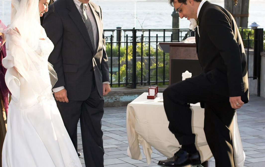 Breaking the Glass: Understanding the Significance of this Interfaith Wedding Tradition