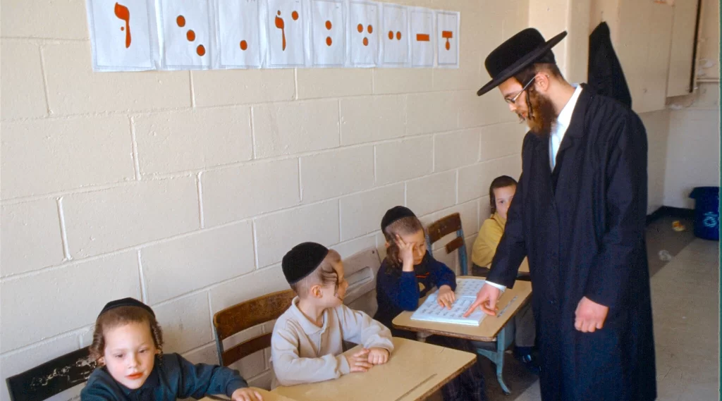 Why do Jewish communities value religious school for children? 